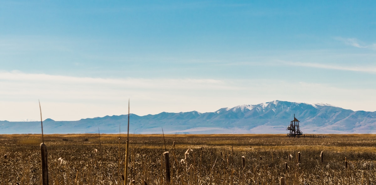 Snow-capped Utah mountains along the I-15 corridor heading south toward Bryce Canyon